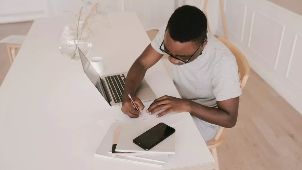 person working on laptop from home