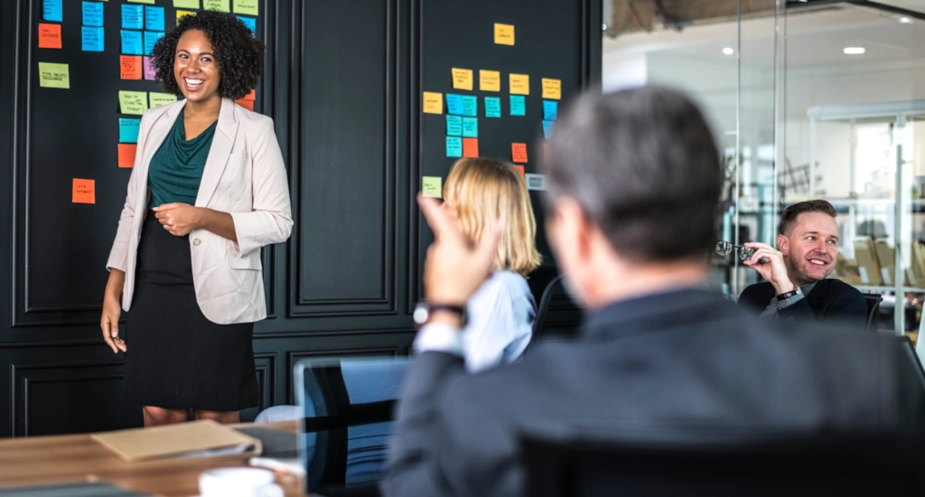 happy worker black woman man in suit