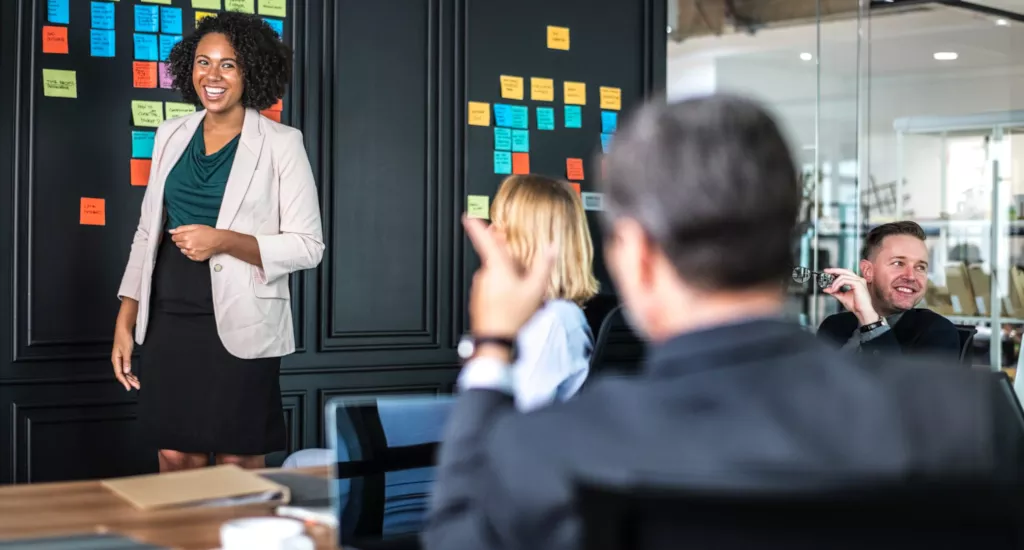 happy worker black woman man in suit