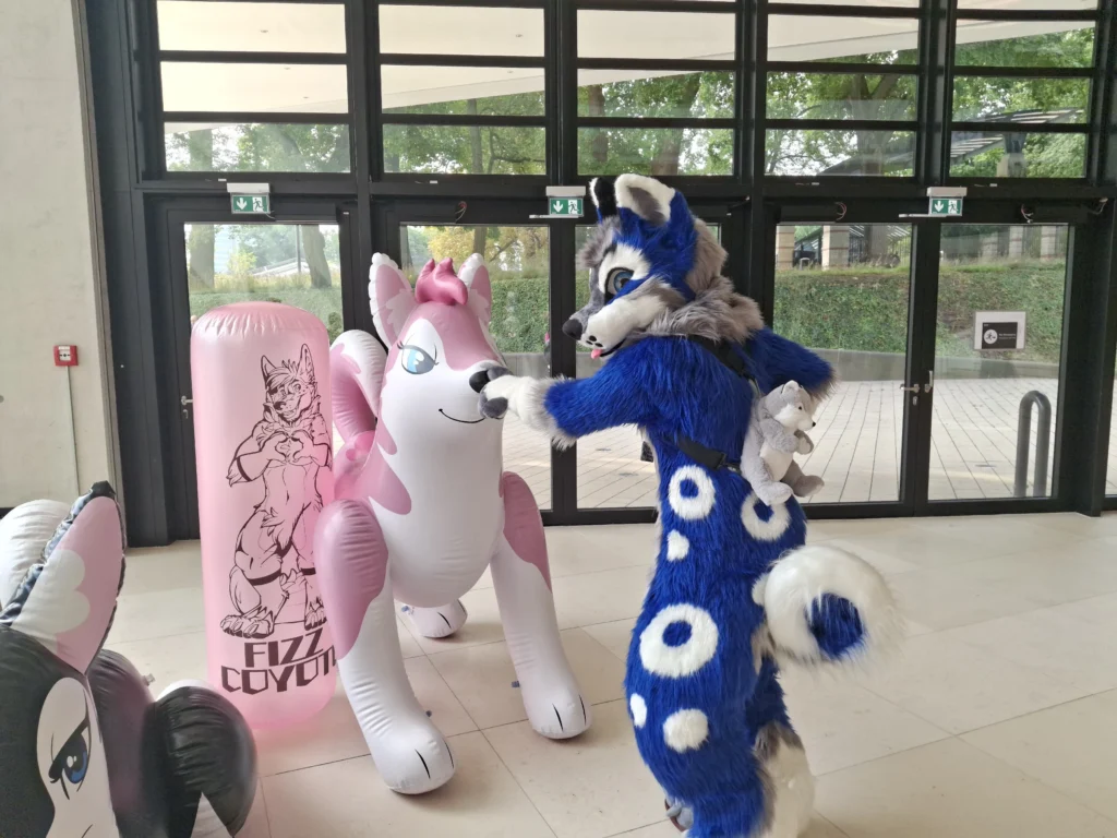 blue wolf and pink inflatable eurofurence furry