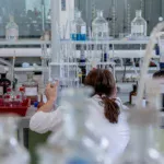 scientist in lab research HIV cure