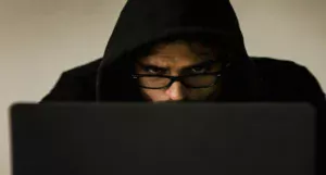 hacker hiding as IT specialist