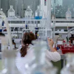 scientist in laboratory experiment