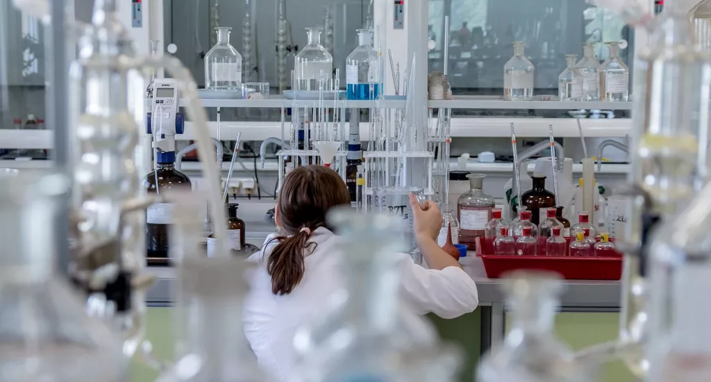 scientist in laboratory experiment