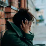 racism black woman suffering